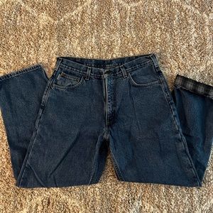 Carhart blue jeans with plaid fabric.